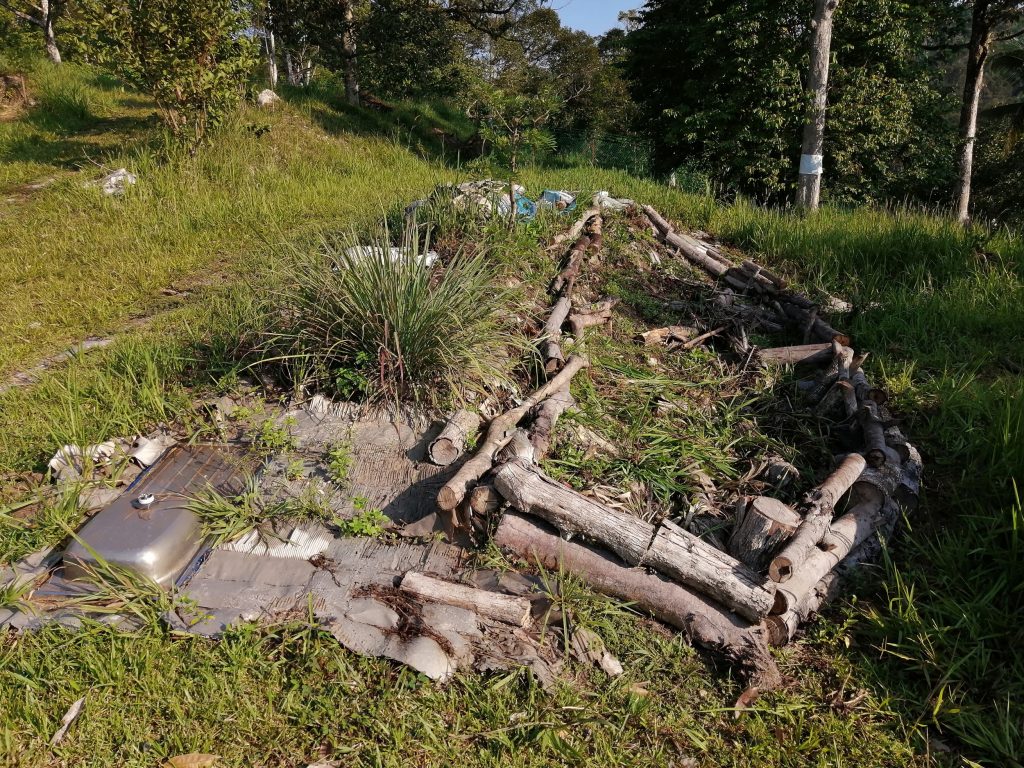 The condition of the raised bed for sweet potatoes before dumping in soil from the pond.