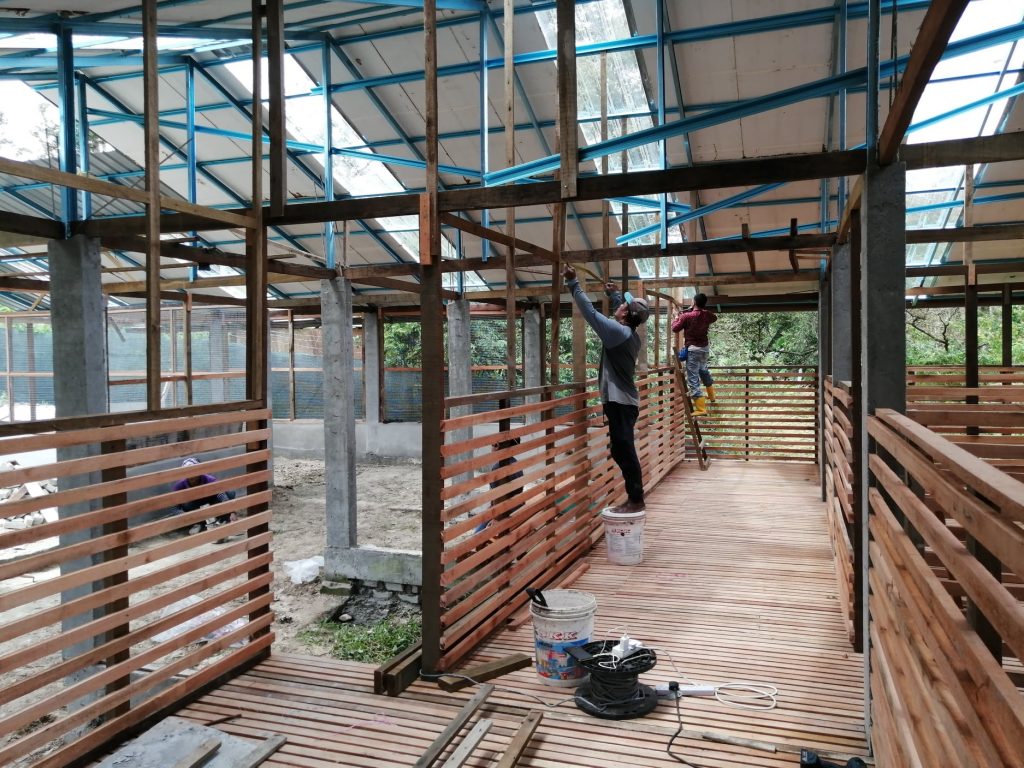 Chest/Shoulder-high partitions for parameter fencing and stall enclosure. Large attic space for housing volunteers and general storage area.