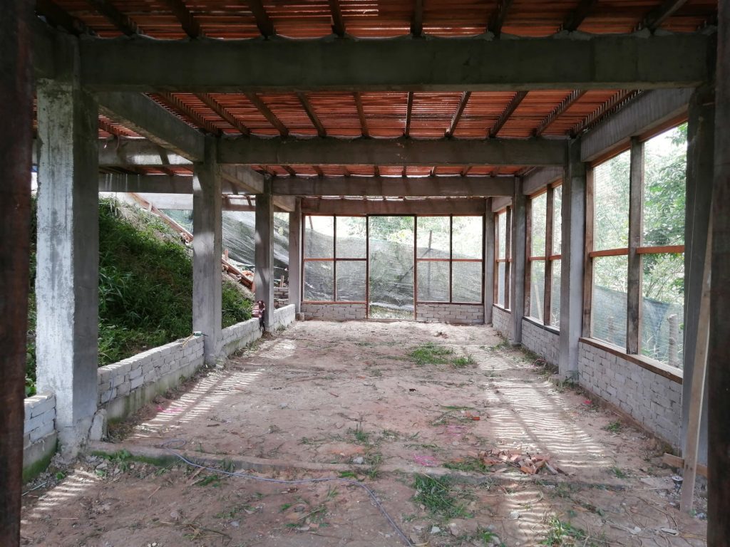 Lower deck for chickens/ducks/geese on selective area basis in accordance to goats/sheeps present above. Option exists to block out and redirect goat/sheep poo/urine to the side for collection using a sloping board.