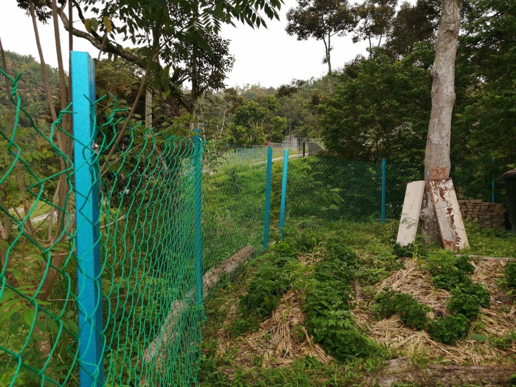 The c-channel posts are simply hammered about 1 feet into the ground.