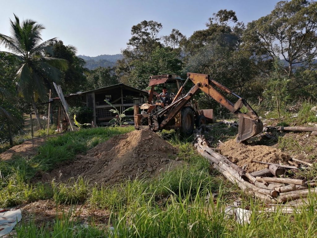 Flash back - Pond dug and soil thrown to side, upon which the food forest referred to is grown. (12 Mar 2020)